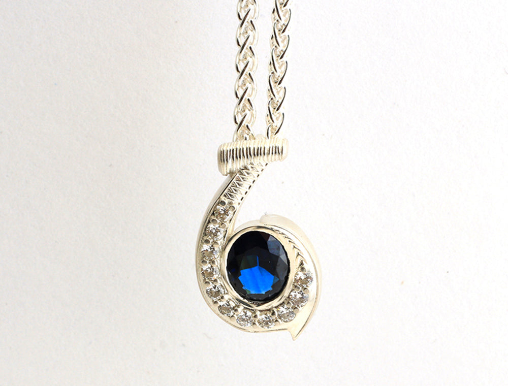 Kerry Polynesian inspired Fish hook pendant